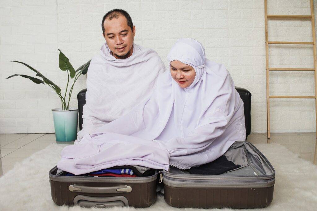 muslim-couple-preparing-umrah-or-hajj-1.jpg